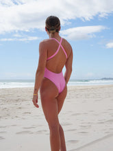 The Levanto One Piece swimsuit by JAYD Swimwear, in Fairy Floss. Open back design for minimal tan lines.